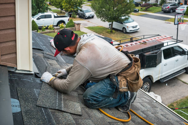 Professional Roofing technician working in West Warwick, RI